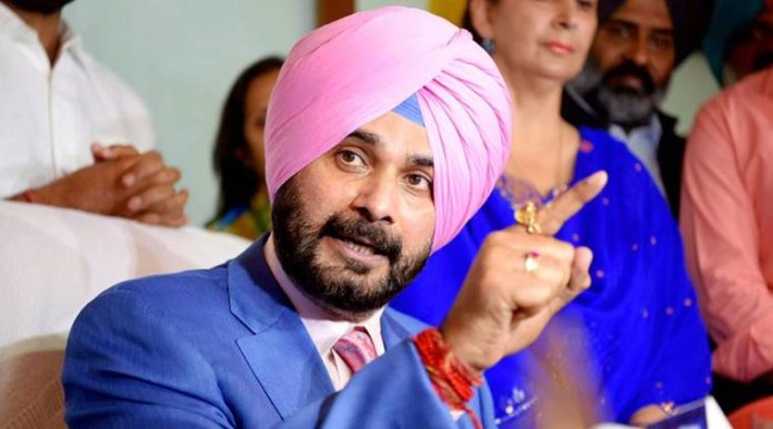 Navjot Singh Sidhu takes charge Navjot Singh Siddhu, Congress, Rahul Gandhi, Manmohan Singh, Captain Amrinder singh,